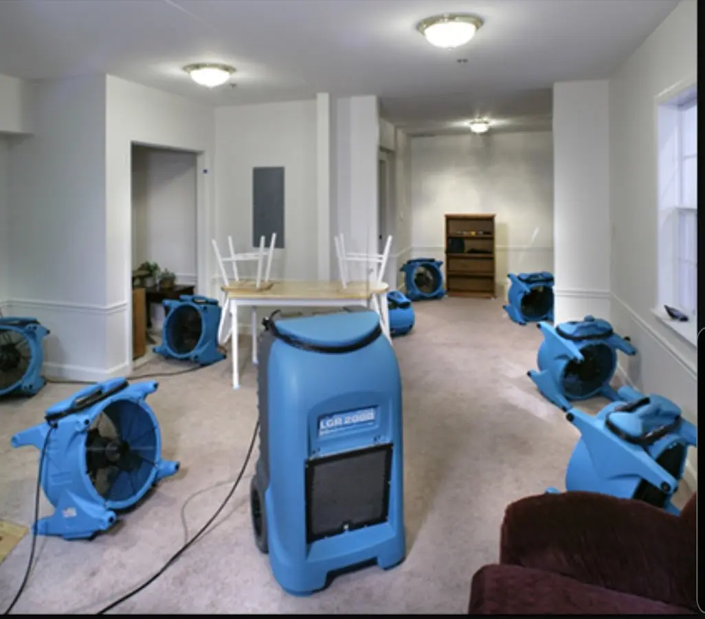 Air movers and dehumidifier setup for Water Damage Restoration in Georgetown